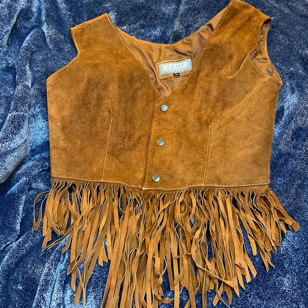 Large brown leather vest with fringe